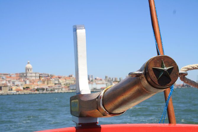 2-Hour Lisbon Traditional Boats Sunset Cruise with White Wine - Key Points