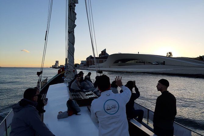 2-Hour Lisbon Traditional Boats Sunset Cruise with White Wine - The Experience: What to Expect