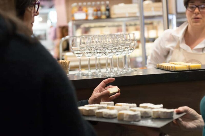 A gourmet and theatrical tour of Les Halles Paul Bocuse - The Sum Up