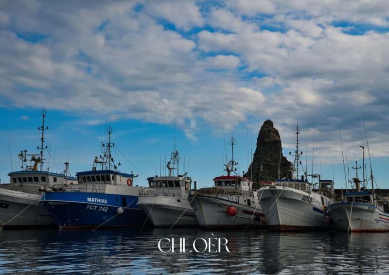 Aci Trezza: Odissey Faraglioni Boat Tour with Swim Stop - The Sum Up