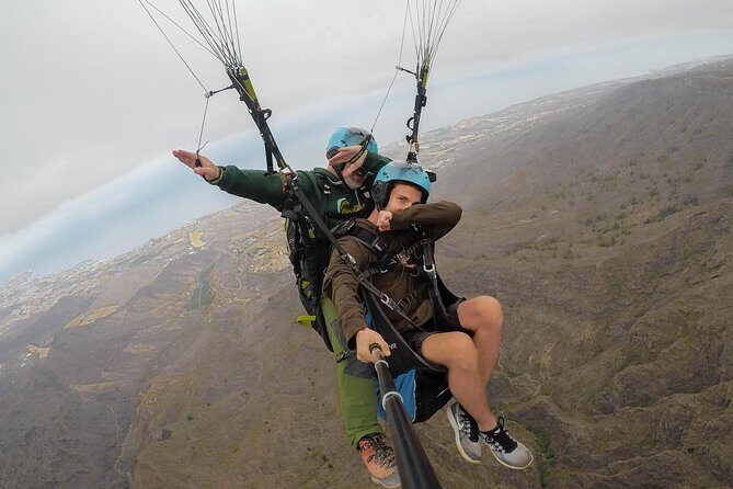 Acrobatic Paragliding Tandem Flight in Tenerife South - Frequently Asked Questions