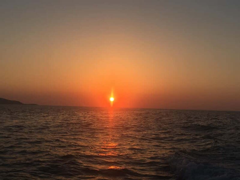Agia Pelagia: Sunset Motorboat Tour with Soft Drinks - Included and Not Included