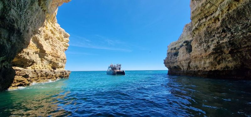 Albufeira: Coastline and Benagil Caves Tour by Catamaran - The Swim Stop in the Atlantic: Quick, Refreshing, and Conditional