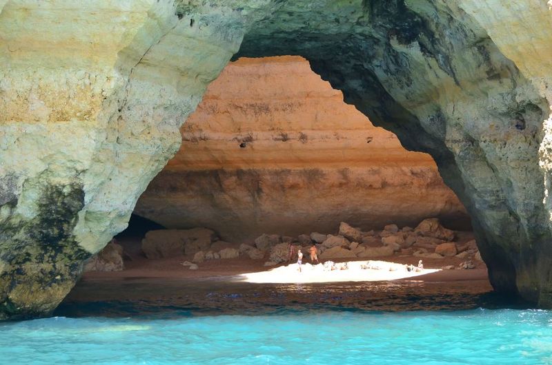Albufeira: Dolphin Watching and Benagil Cave Boat Cruise - Sea caves and what they feel like in person