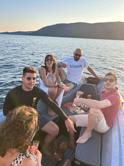Alghero: boat tour with aperitif at sunset Porto Conte - Frequently Asked Questions