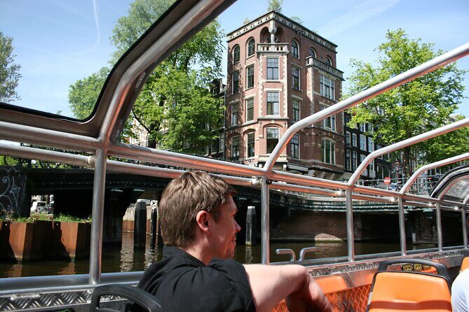 Amsterdam 1h Canal Cruise by Semi-Open Boat with Audio Guide - What to Expect from the Canal Cruise Experience