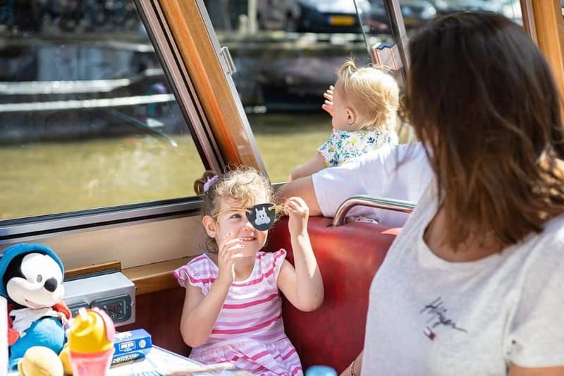 Amsterdam: 75 Minute City Canal Cruise with Audio Guide - Snacks, Drinks, and On-Board Comfort