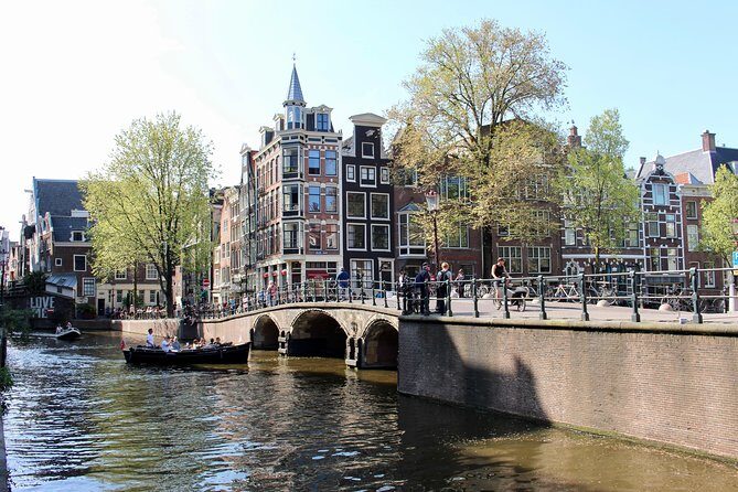 Amsterdam Canal Tour by Open Boat – 90 min Small Group Experience - Cancellation and Logistics