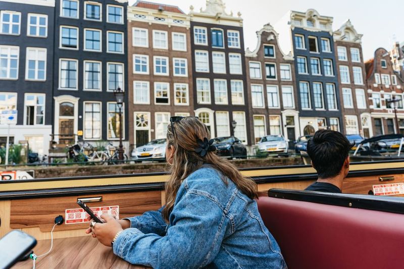 Amsterdam: Heated Canal Cruise Including Audioguide - The NEMO Science Museum and the Skinny Bridge: Quick, Iconic Photostops
