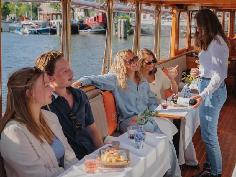 Amsterdam: Classic Saloon Boat Cruise with Cheese & Wine - What This Experience Offers