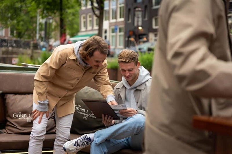 Amsterdam: Covered Heated Canal Cruise with Bitterballen - Key Points