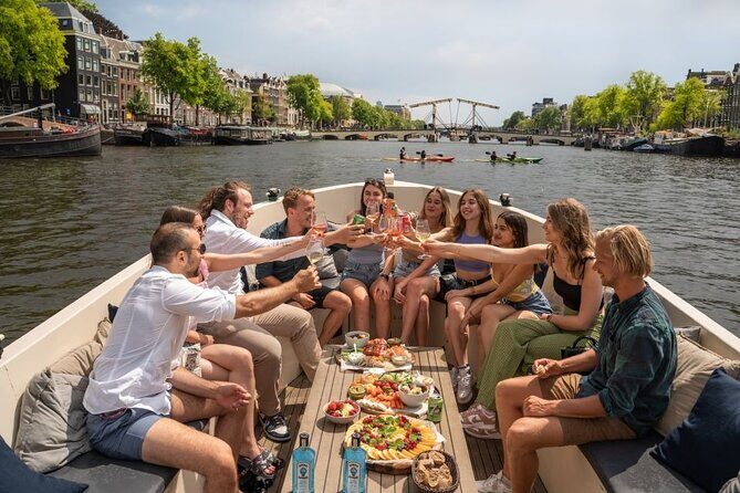 Amsterdam: Evening City Centre Canal Cruise with Unlimited Drinks - What to Expect on the Itinerary