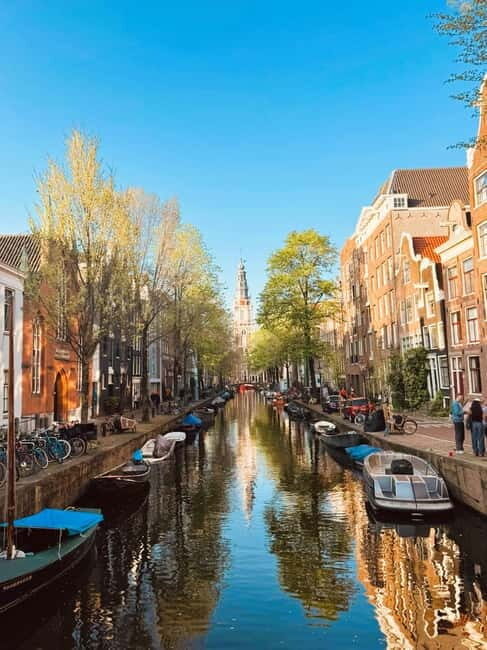 Amsterdam: Guided bike tour in French off the beaten track - Practical Details & Booking