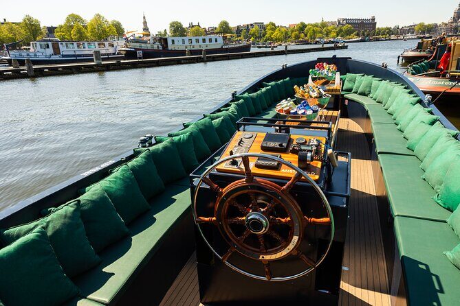 Amsterdam: Guided Open Boat Canal Cruise Including 1 Drink - Introduction