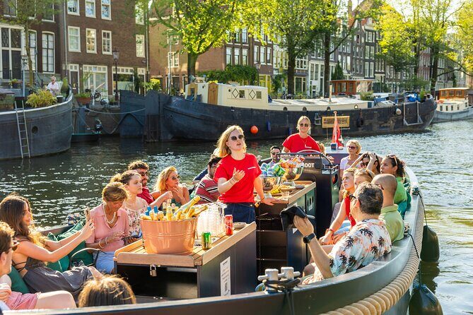 Amsterdam: Guided Open Boat Canal Cruise Including 1 Drink - Key Points