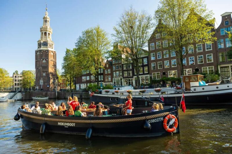 Amsterdam: Guided Open Boat Cruise Unlimited Drinks Option - The Experience in Detail