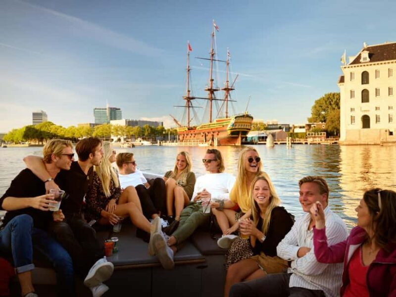 Amsterdam: Heated Cruise with Local Guide & Optional Drinks - The Experience in Detail
