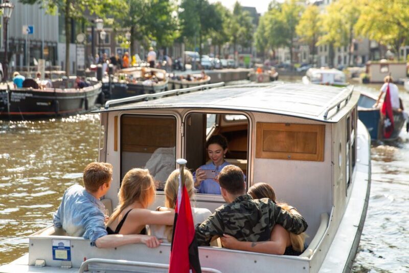 Amsterdam: Historic Boat Cruise with open bar and nibbles - An Overview of the Experience