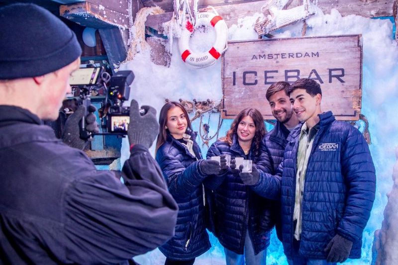 Amsterdam: Icebar Entry Ticket with 3 Drinks - Inside the ice bar at -10°C: ice sculptures, party lights, and real cold
