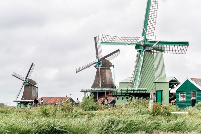 Amsterdam: Guided Zaanse Schans, Windmills & Cheese Tour - Optional Amsterdam Canal Cruise: how the voucher usually fits