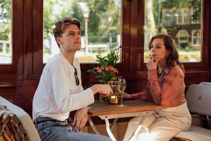 Amsterdam: Luxury Saloon Boat Cruise with Cocktails & Waffle - Montelbaanstoren and the Amstel: Views That Snap Into Focus