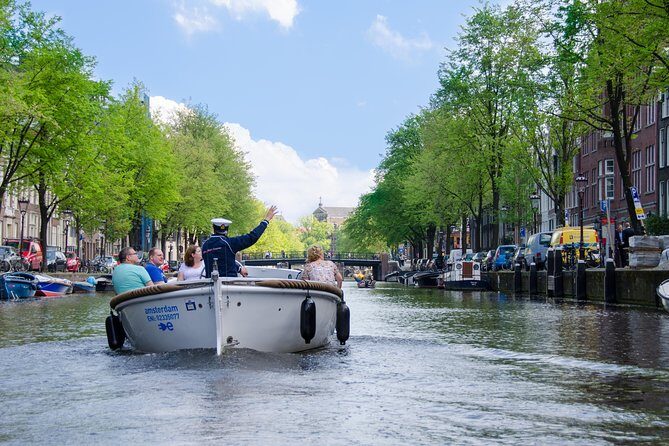 Amsterdam Open Boat Sightseeing Canal Cruise - The Experience on the Water: Sights and Atmosphere