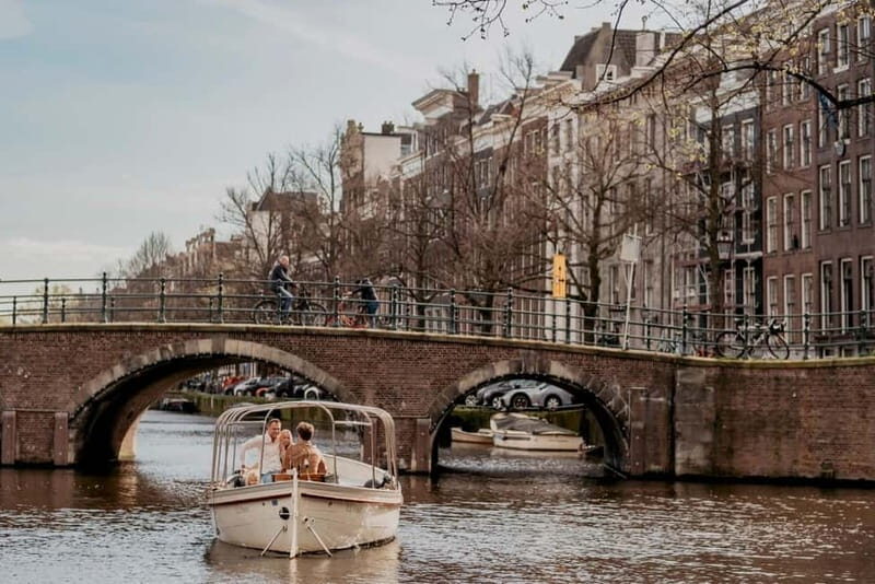 Amsterdam: Private Canal Cruise with snacks and drinks - The Sum Up