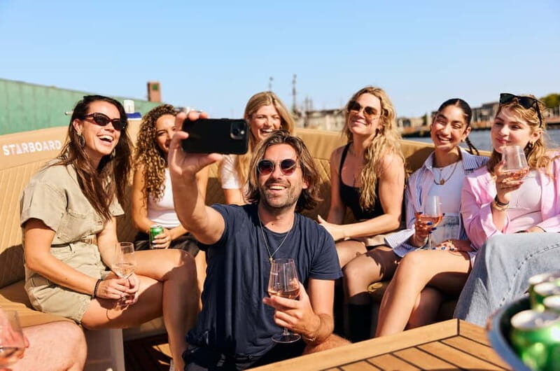 Amsterdam: Spanish Guided Open Boat Cruise with Bar Onboard - Key Points