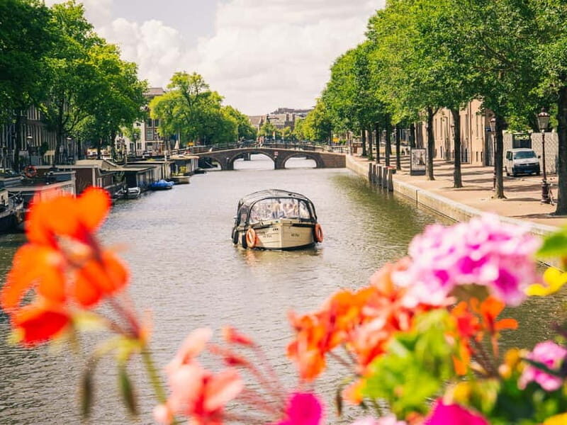 Amsterdam: Spanish Guided Open Boat Cruise with Bar Onboard - FAQ