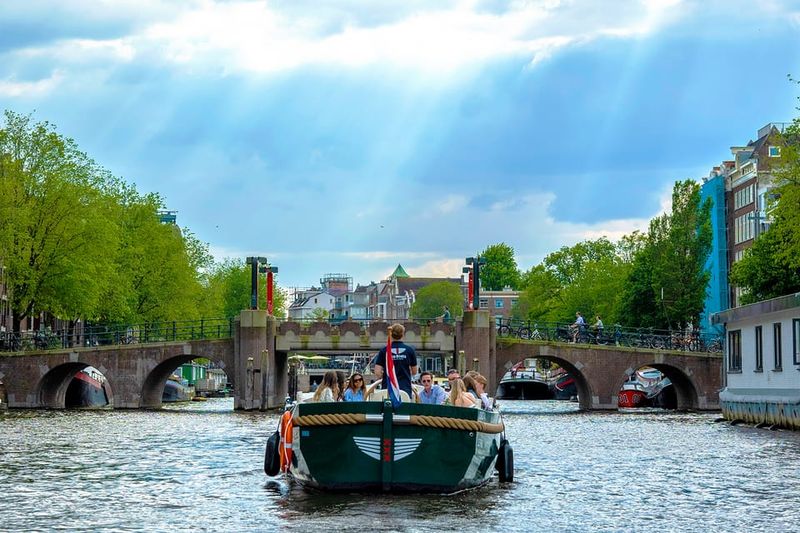 Amsterdam: The Newest Canal Cruise with Drink Option - Optional Drink Plan: How the Wine, Beer, or Soda Changes the Trip