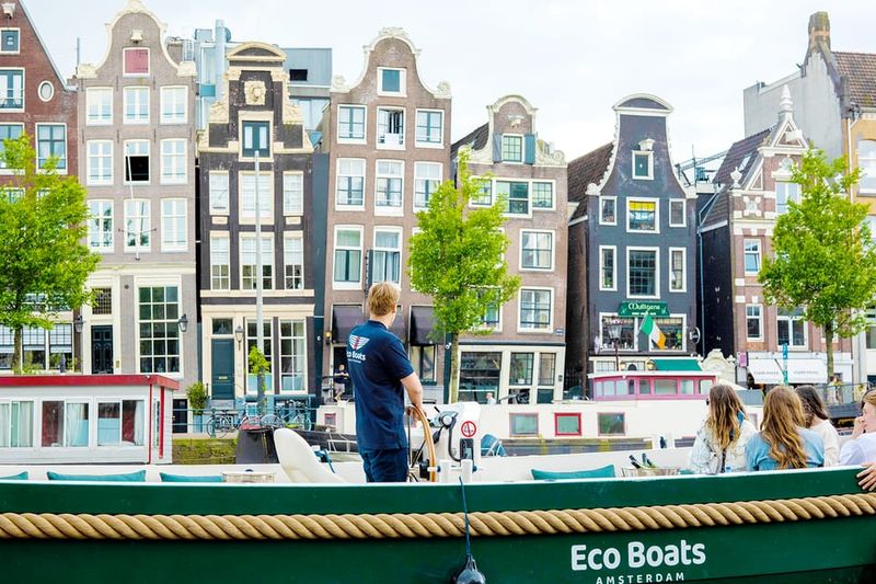 Amsterdam: The Newest Canal Cruise with Drink Option - Weather Reality: Open vs. Covered Boat, and the Cozy Tips Travelers Mention