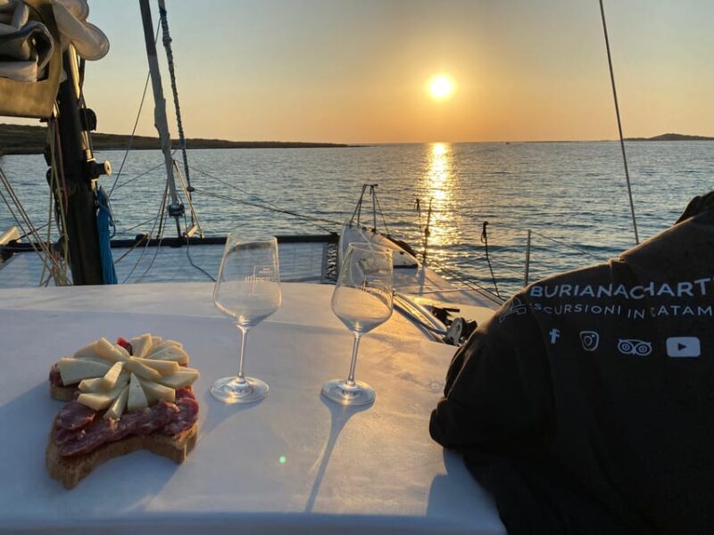 aperitifs at sunset on the Stintino catamaran burianaCharter - The Sum Up