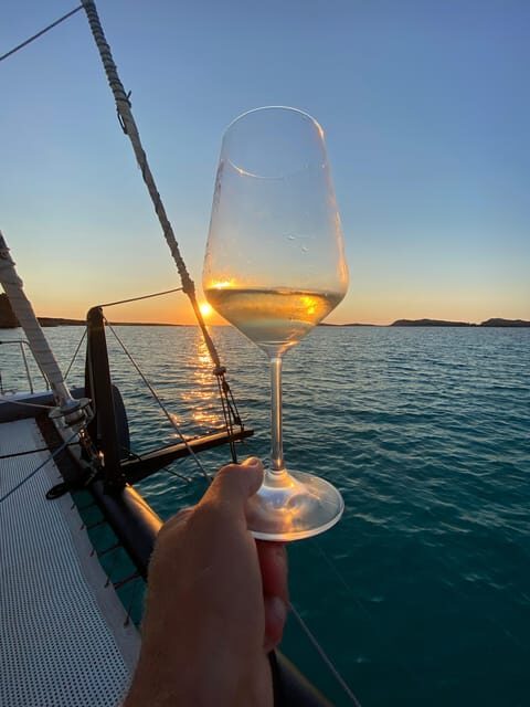 aperitifs at sunset on the Stintino catamaran burianaCharter - FAQ