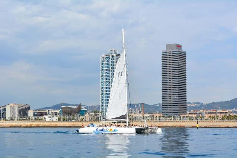Barcelona: Catamaran Party Cruise with BBQ Meal - Out on the water: cruise vibes along Barcelona’s coast