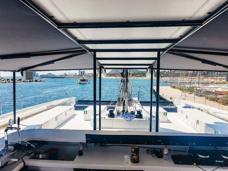 Barcelona: Catamaran Party Cruise with BBQ Meal - The swimming stop near Badalona: fun, but not guaranteed