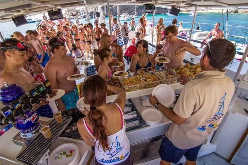 Barcelona: Catamaran Party Cruise with BBQ Meal - Music, dancing, and crew energy: the social engine
