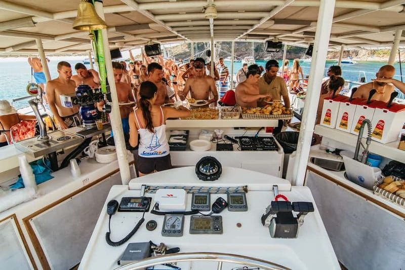 Barcelona: Catamaran Party Cruise with BBQ Meal - Sunbathing vs. partying: you can do both on a catamaran deck