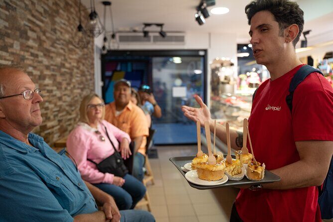 Barcelona: Evening Foodie Adventure with 8 Tapas & 4 Drinks - A Deep Dive into the Experience