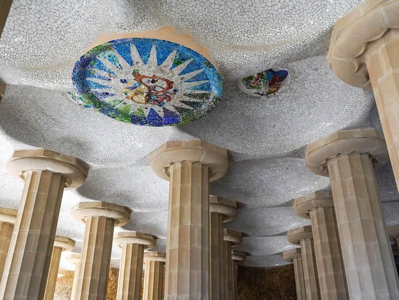 Barcelona: Sagrada Familia and Park Güell Tour - Inside the Sagrada Familia: headsets, vaults, and meaning