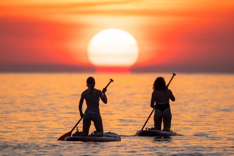 Barcelona: Sunrise Paddleboarding with Instructor and Photos - Why Travelers Love This Tour