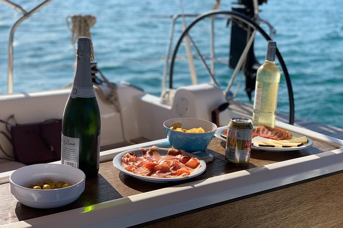 Barcelona Sunset Cruise with Light Snacks and Open Bar - What to Bring and Wear