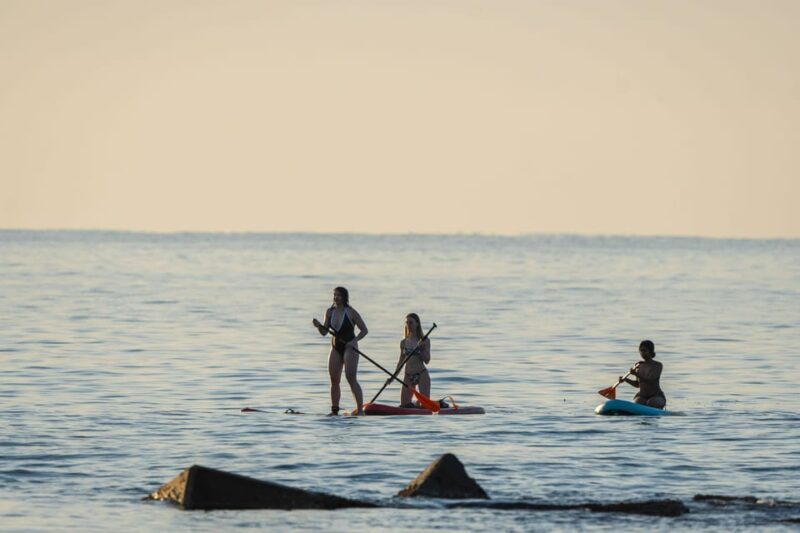 Barcelona: Sunset Paddleboarding Experience with 1 Beer - Key Points