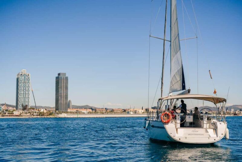 Barcelona Sunset Sailing Experience with open bar and snakcs - What is the Barcelona Sunset Sailing Experience?
