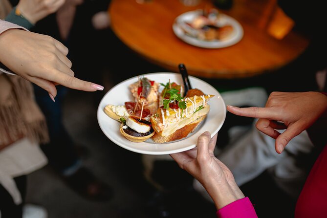 Barcelona Tapas Food Tour with Lunch or Dinner in El Born - Stop 3: Carrer de la Mercè and a Family Bodega Since 1945