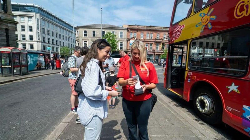 Belfast: City Sightseeing Hop-On Hop-Off Bus Tour - Stops Near the Falls and Shankill Areas: McAdam Ó Fiaich, Falls Road, and Crumlin Road Gaol