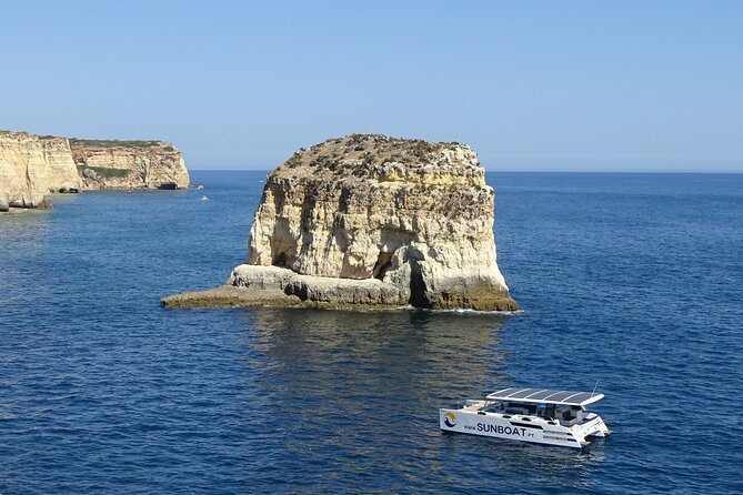 Benagil Caves & Coast from Portimão on an Eco-Friendly Catamaran - Farol de Alfanzina: the deep cave stop, only if the weather cooperates