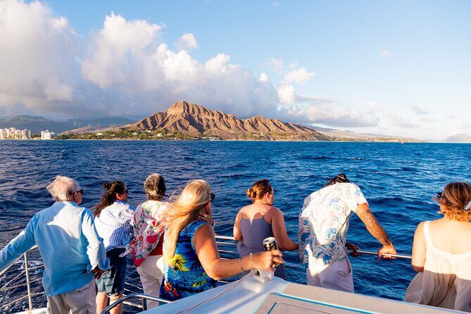 Board from Waikiki Beach for a scenic Sunset Sail on the Hwea - The Sum Up