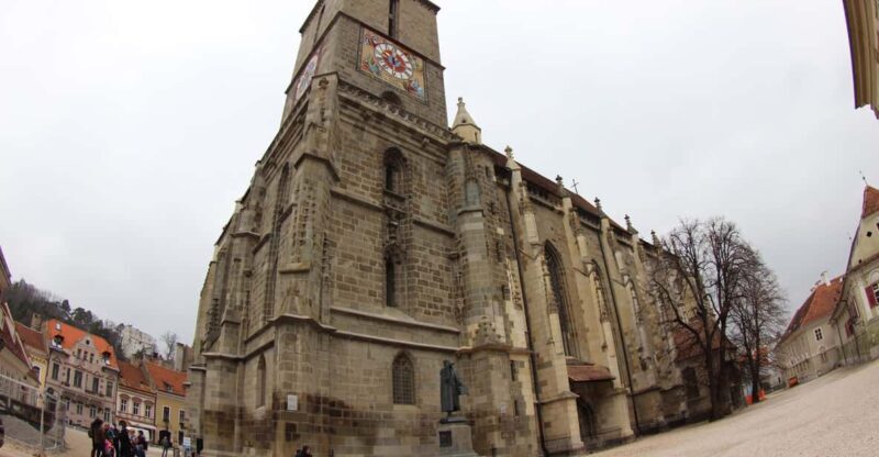 Brasov: Guided City Walking Tour with Wine - Exploring Brasov After Dark