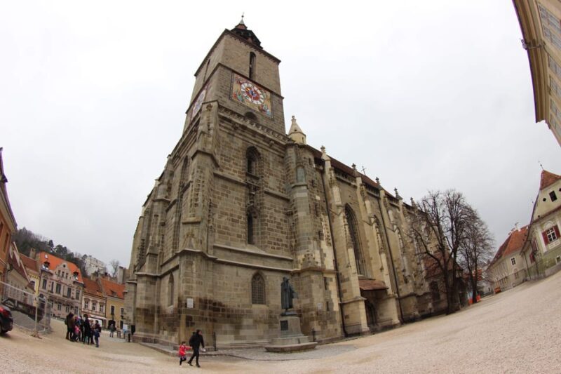 Brasov: Guided City Walking Tour with Wine - Group Dynamics and Practical Details