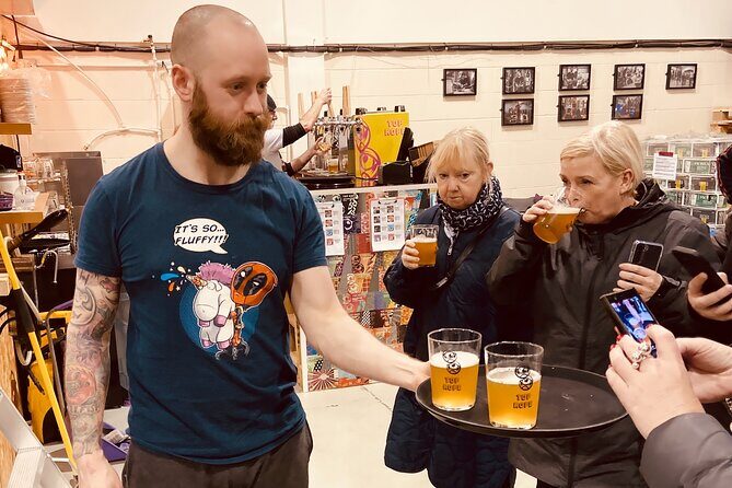 Brewery bus tour, 4 breweries, 12 beers, 1 pizza, 1 bus - Key Points